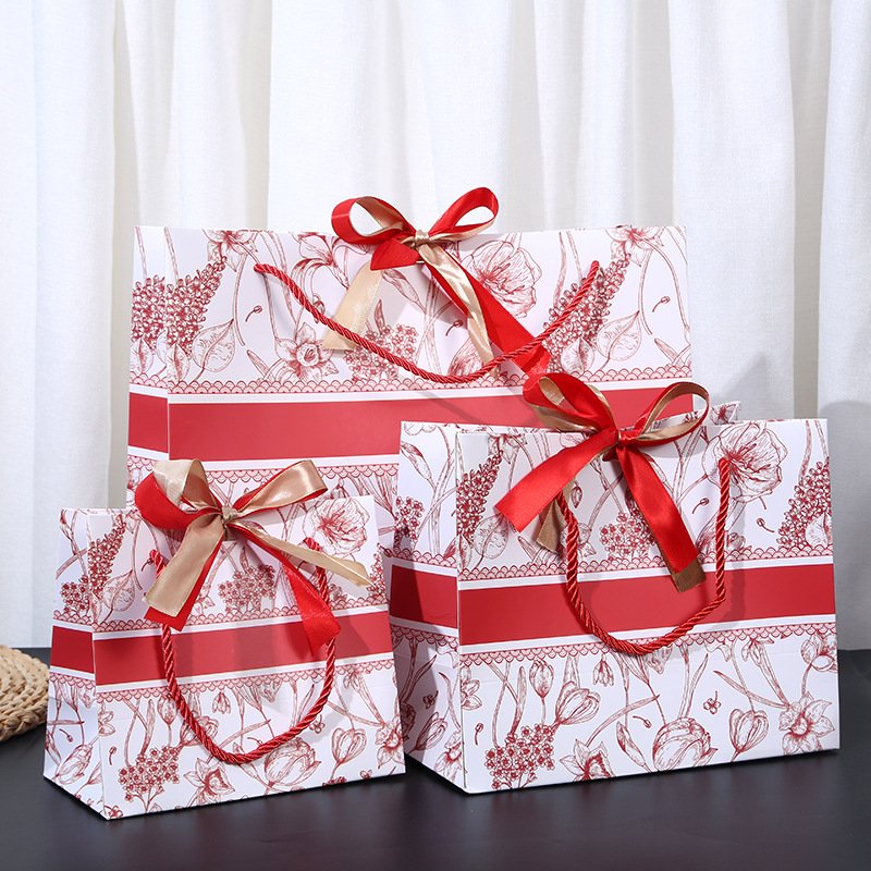 red Luxury handle Paper Bags with ribbon printed flowers