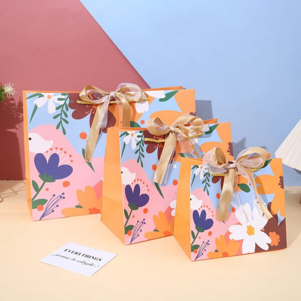 OEM Luxury handle Paper Bags with ribbon printed flowers
